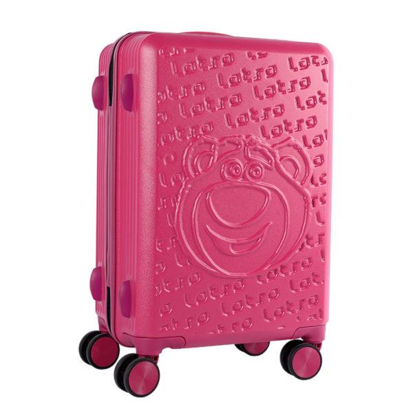 Angled view of pink LOTSO suitcase, showcasing embossed design for IP-licensed wholesale