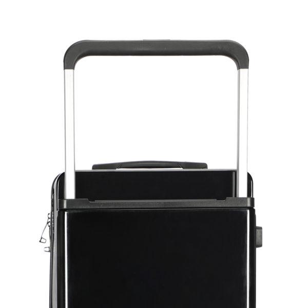 Close - up of telescopic handle on black MICKEY suitcase, highlighting durability for wholesale