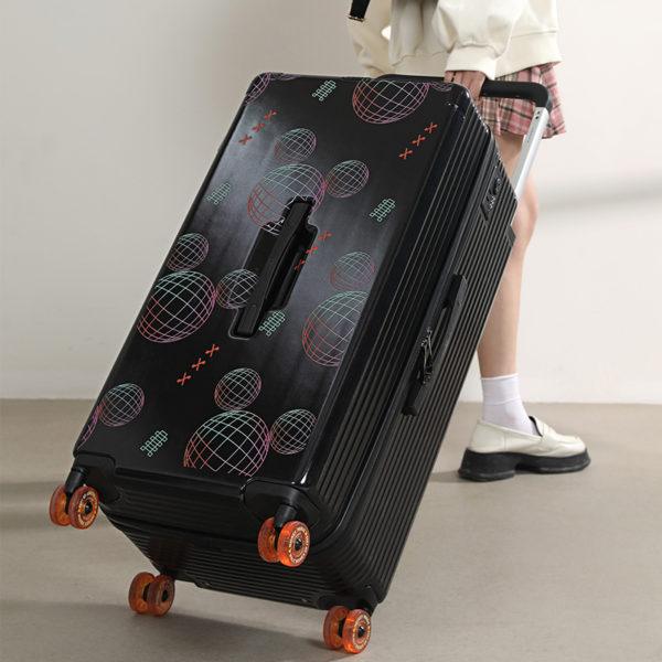 Person pulling black MICKEY suitcase, highlighting smooth mobility for wholesale under Disney IP