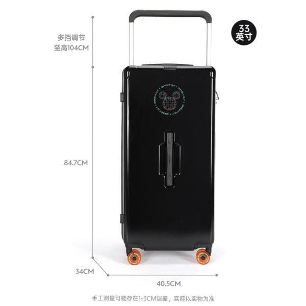 Side view of black MICKEY suitcase with orange wheels, suitable for wholesale under Disney IP