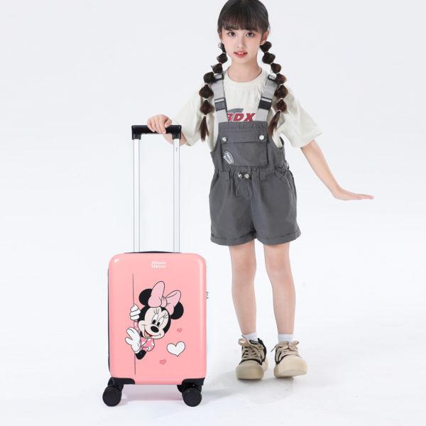 Child showcasing pink Disney Minnie suitcase, emphasizing kid-friendly size for wholesale