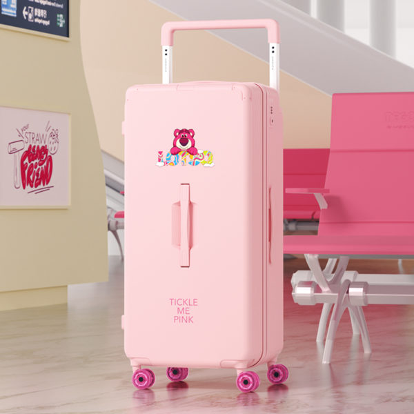 Pink LOTSO suitcase in an airport setting, highlighting travel - ready style for wholesale & Disney IP licensing