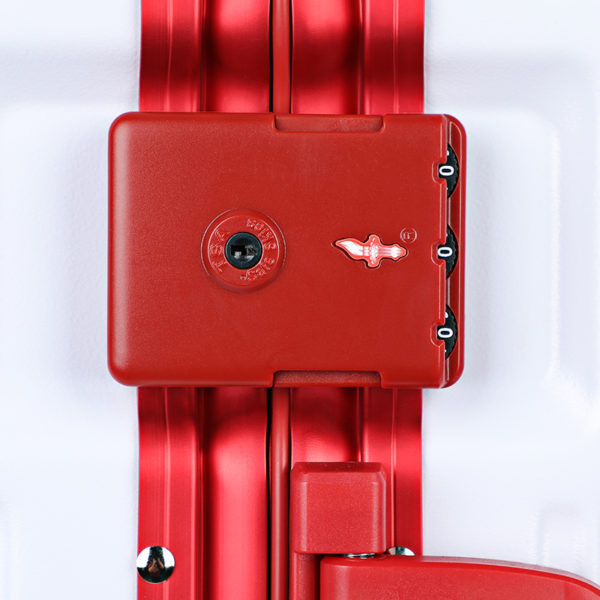 Close - up of red combination lock on 20 - inch Mickey suitcase, emphasizing security for Disney IP - licensed wholesale