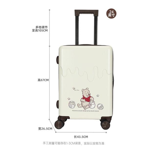 A detailed size chart for the 24-inch Winnie the Pooh suitcase, showing dimensions (67 cm height, 26.5 cm width, 43.5 cm length) with adjustable handle height.